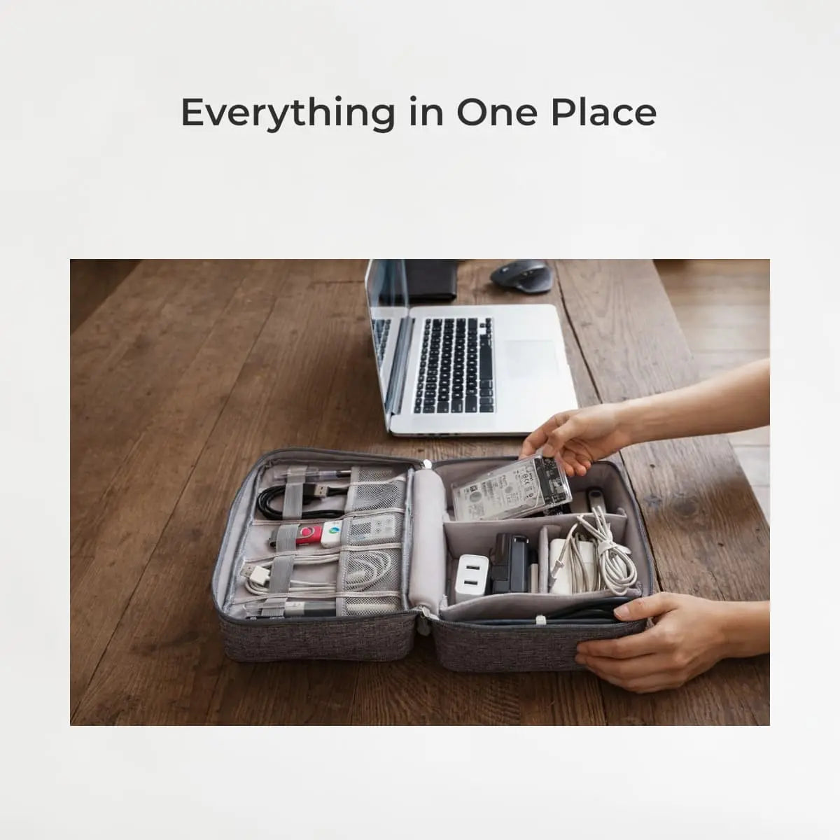 Organized travel case with electronic accessories on a wooden desk, text 'Everything in One Place'.