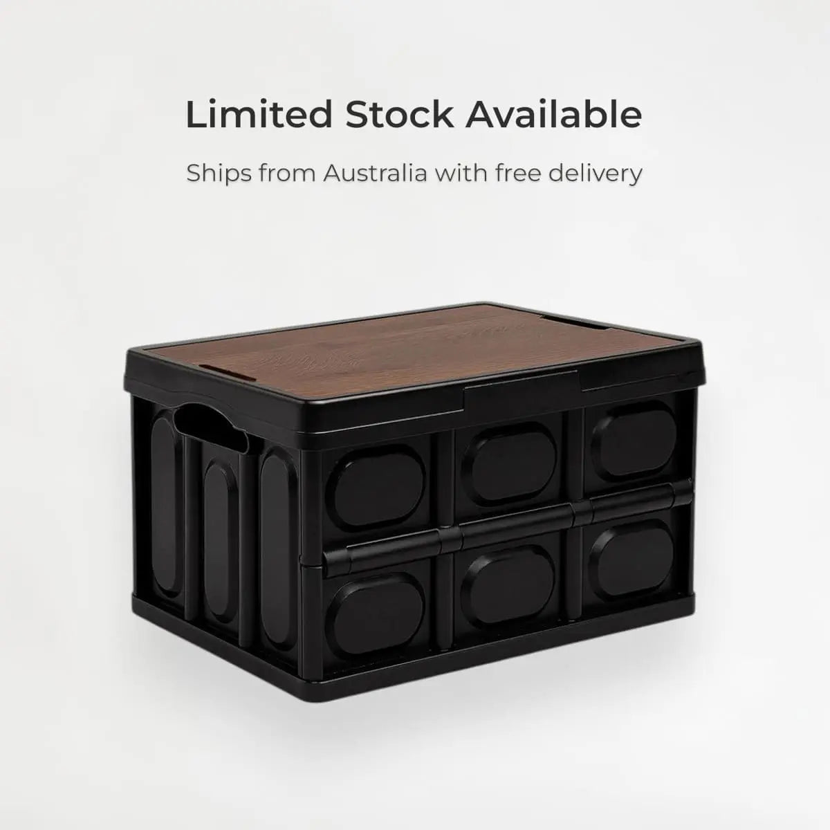 Black storage crate with wooden top on a white background