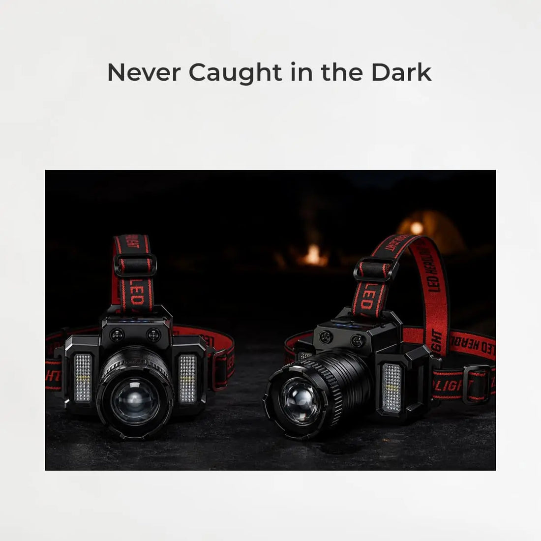 Two headlamps with red straps on a dark background, text 'Never Caught in the Dark' above.
